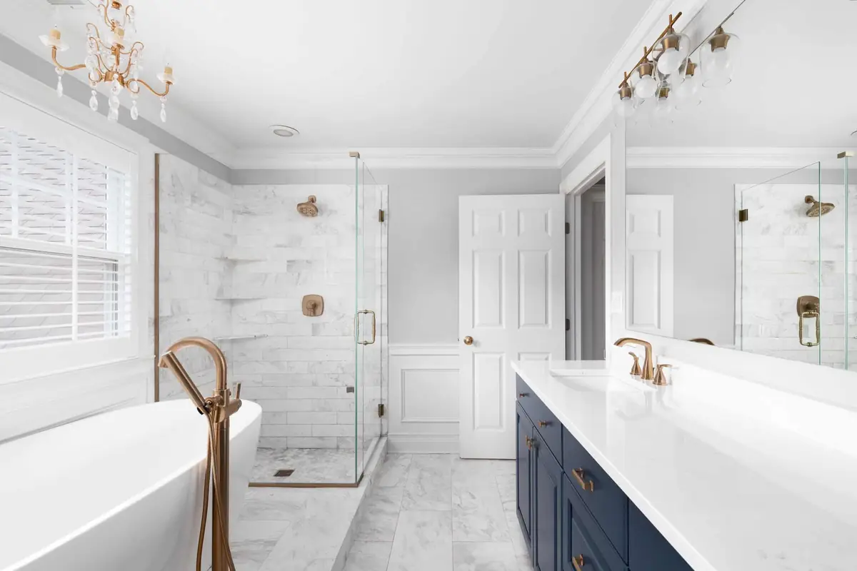 Remodeled bathroom with a walk-in shower by Geek Construction Team in Asheville, NC