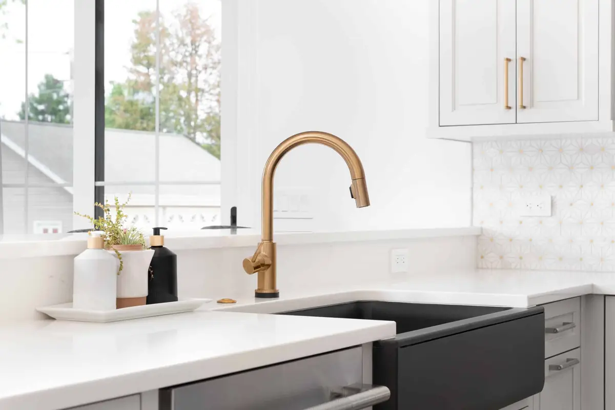 Remodeled kitchen with an island sink by Geek Construction Team in Asheville, NC